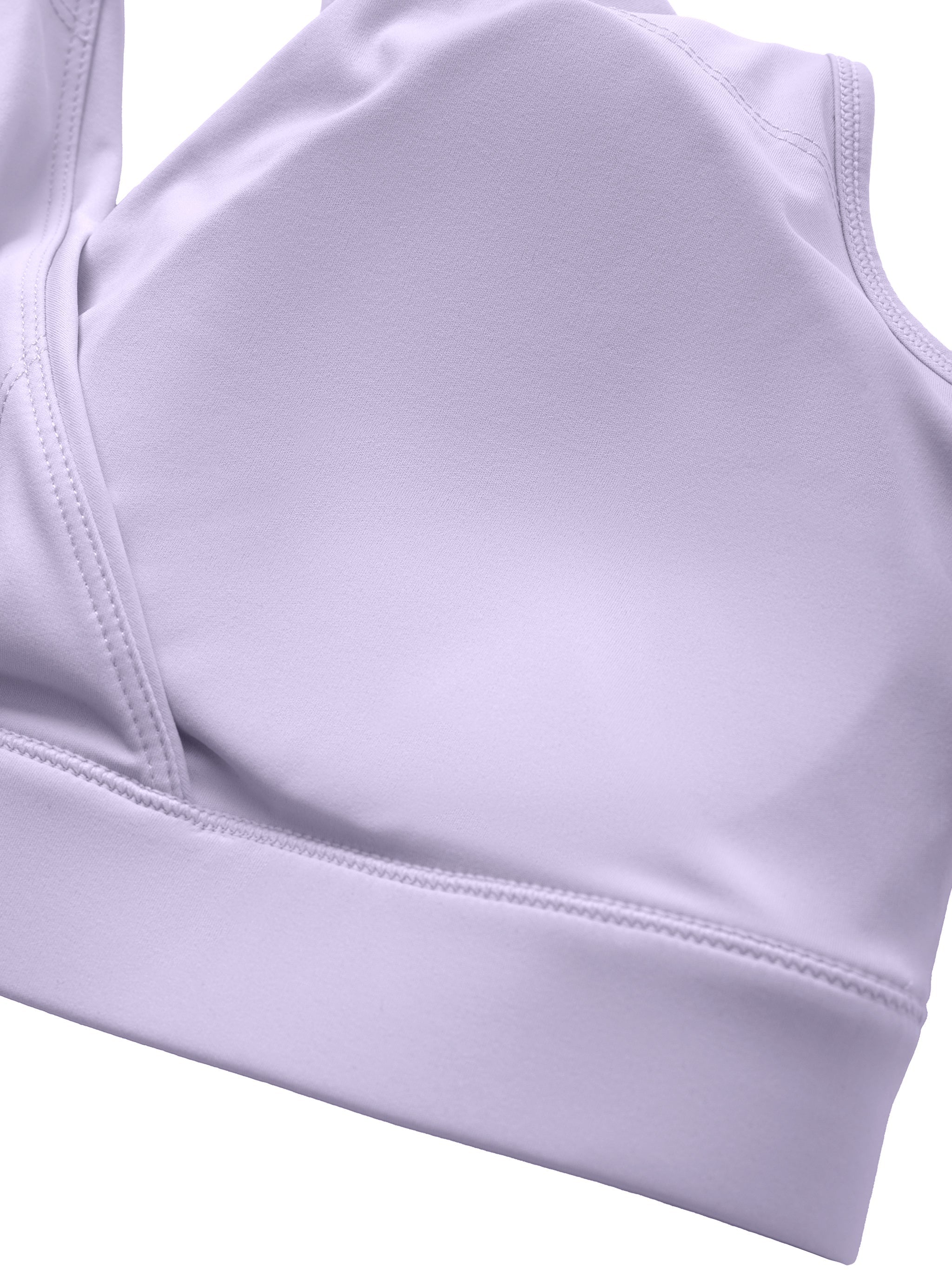 Close-up of lilac women's crossover V-neck sports bra with soft stretch fabric