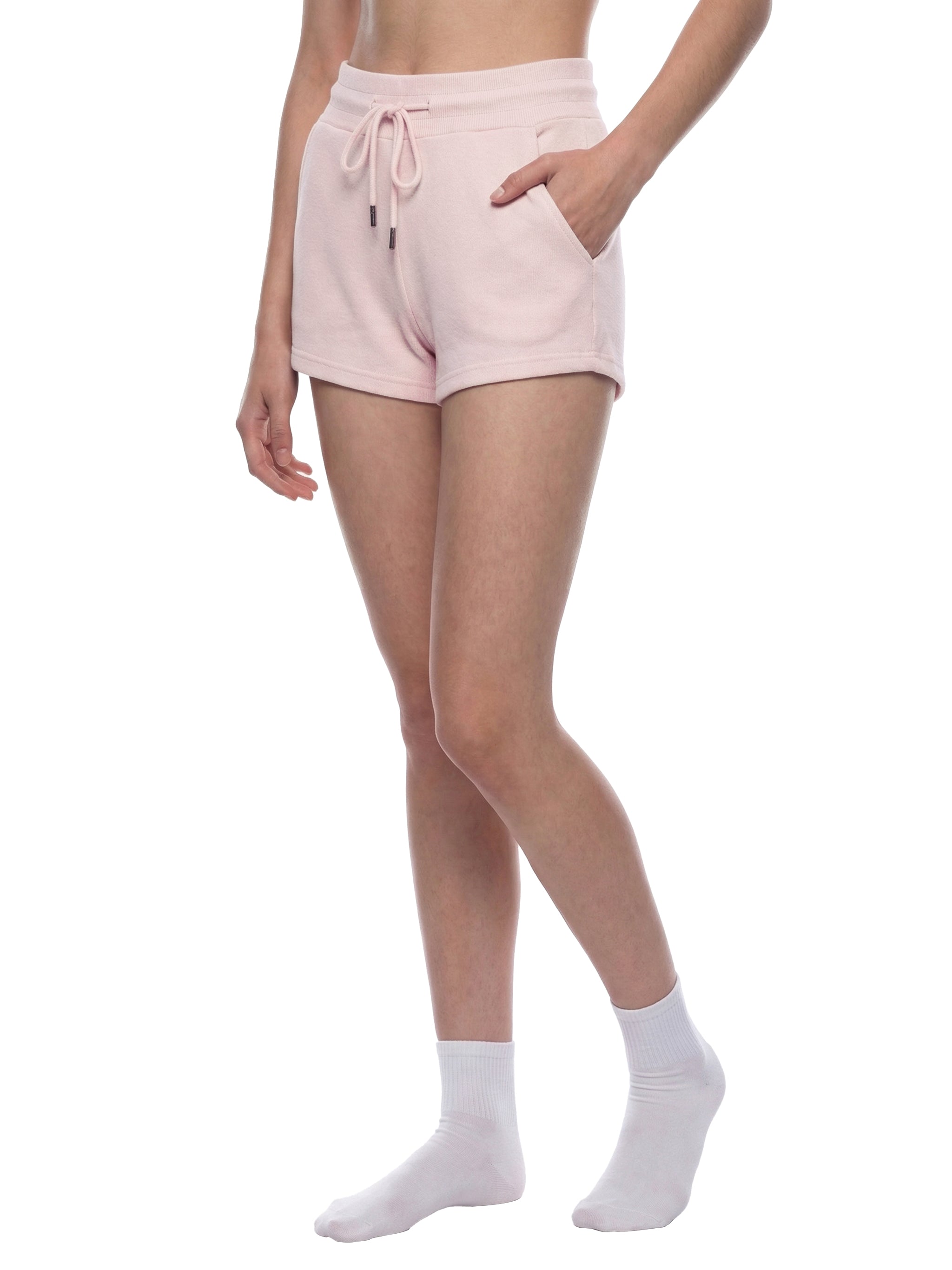 Women's light pink drawstring shorts with pockets, modeled on a white background