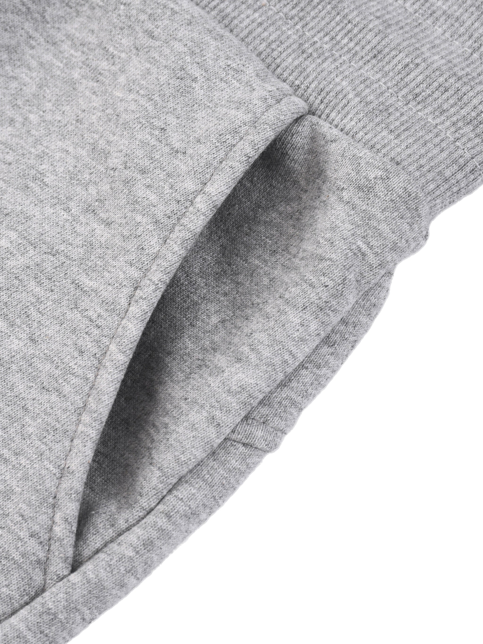 Close-up of gray women's drawstring shorts pocket and ribbed waistband