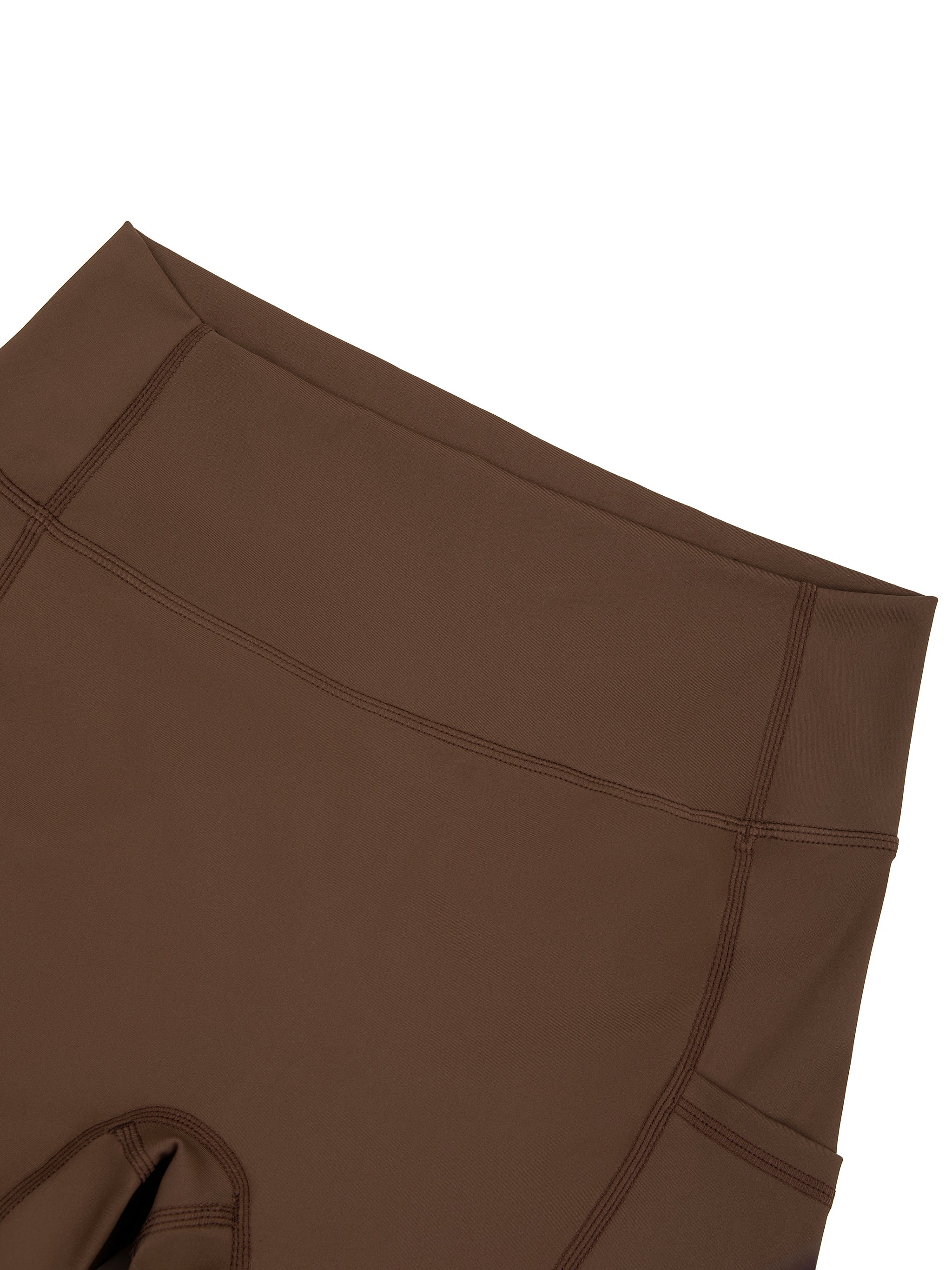 Brown women's high-waisted biker shorts with side pocket and flatlock stitching