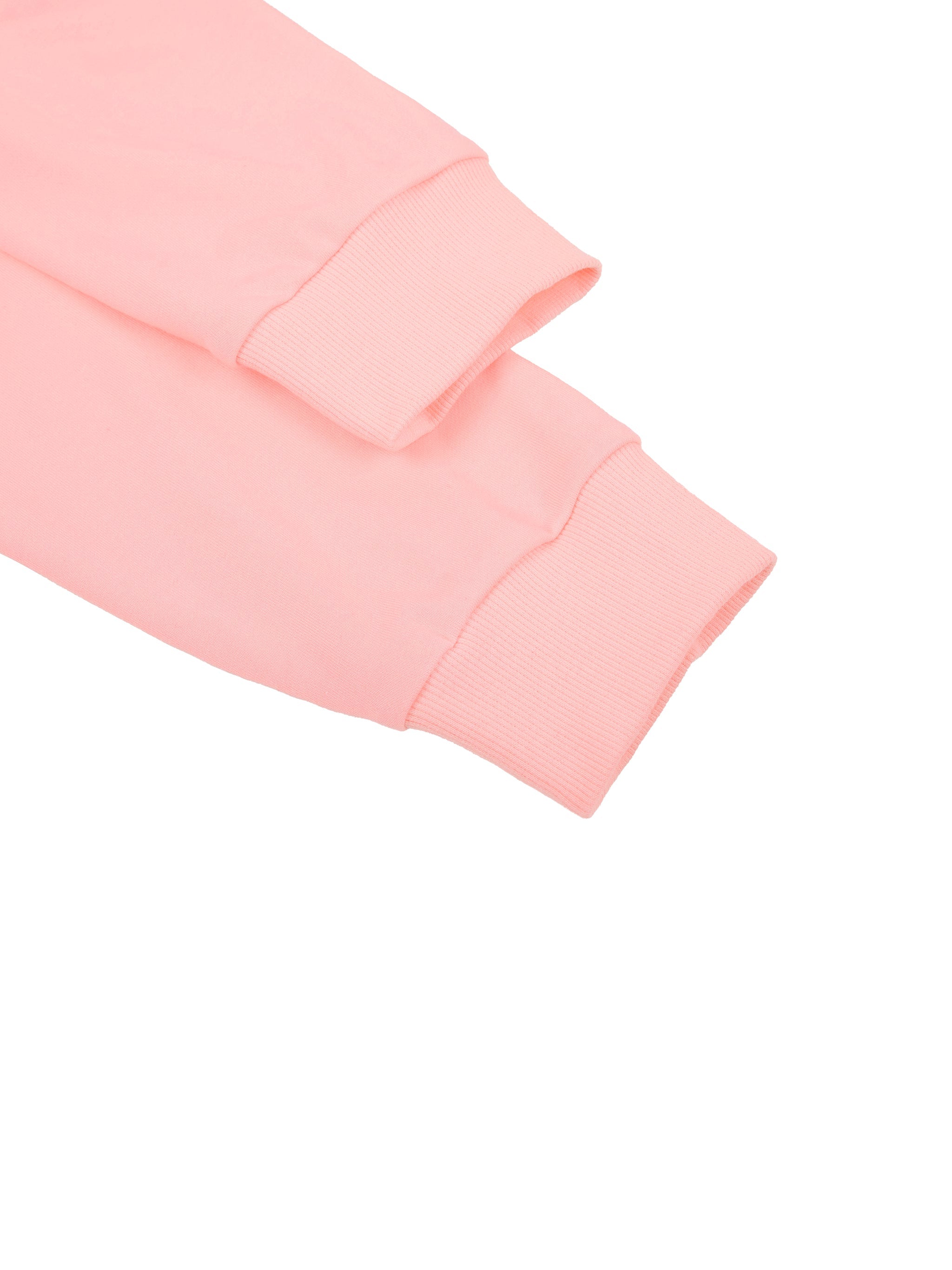 Close-up of pink women's off-shoulder sweatshirt sleeves on white background