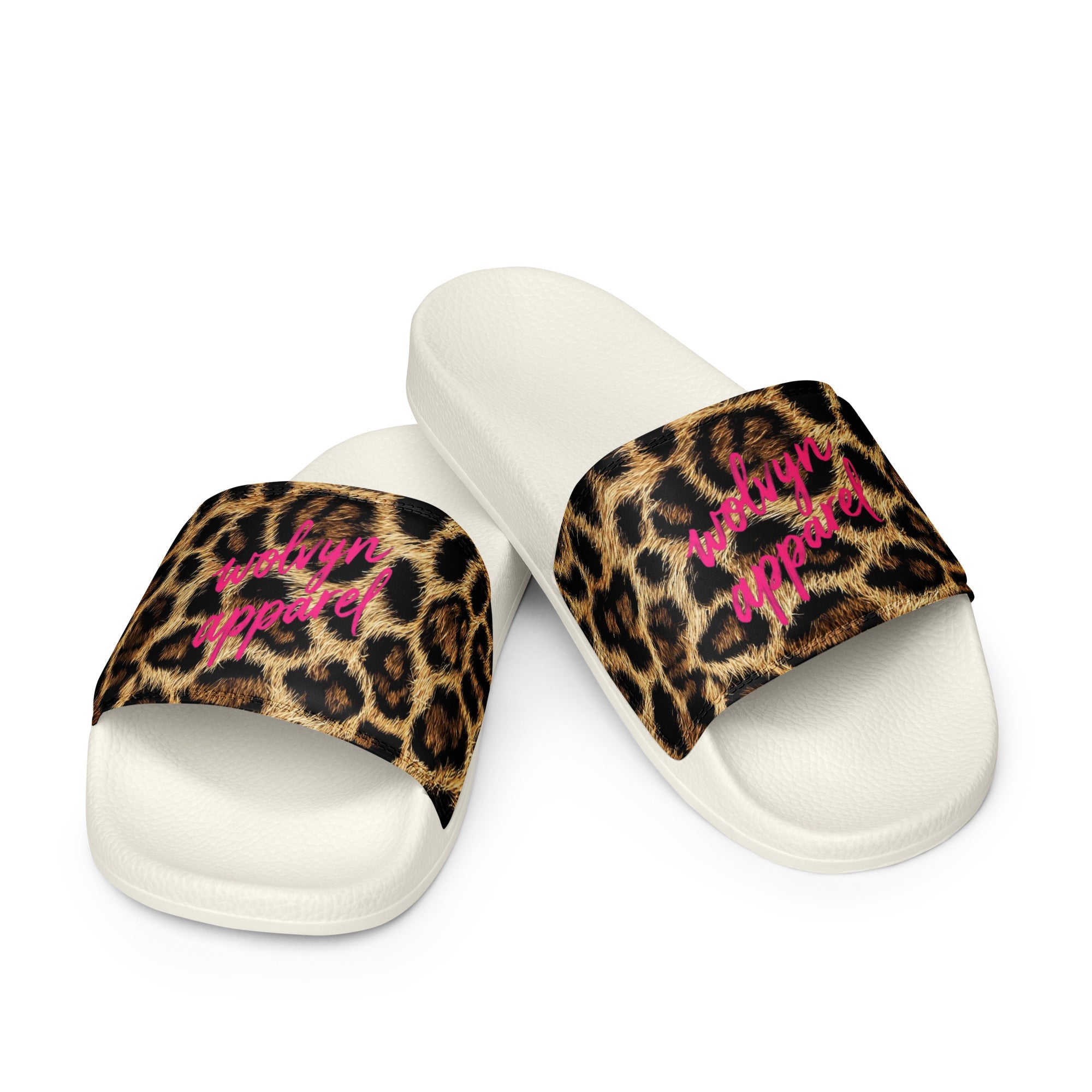 Women's white slides with leopard print strap and pink script text on a white background