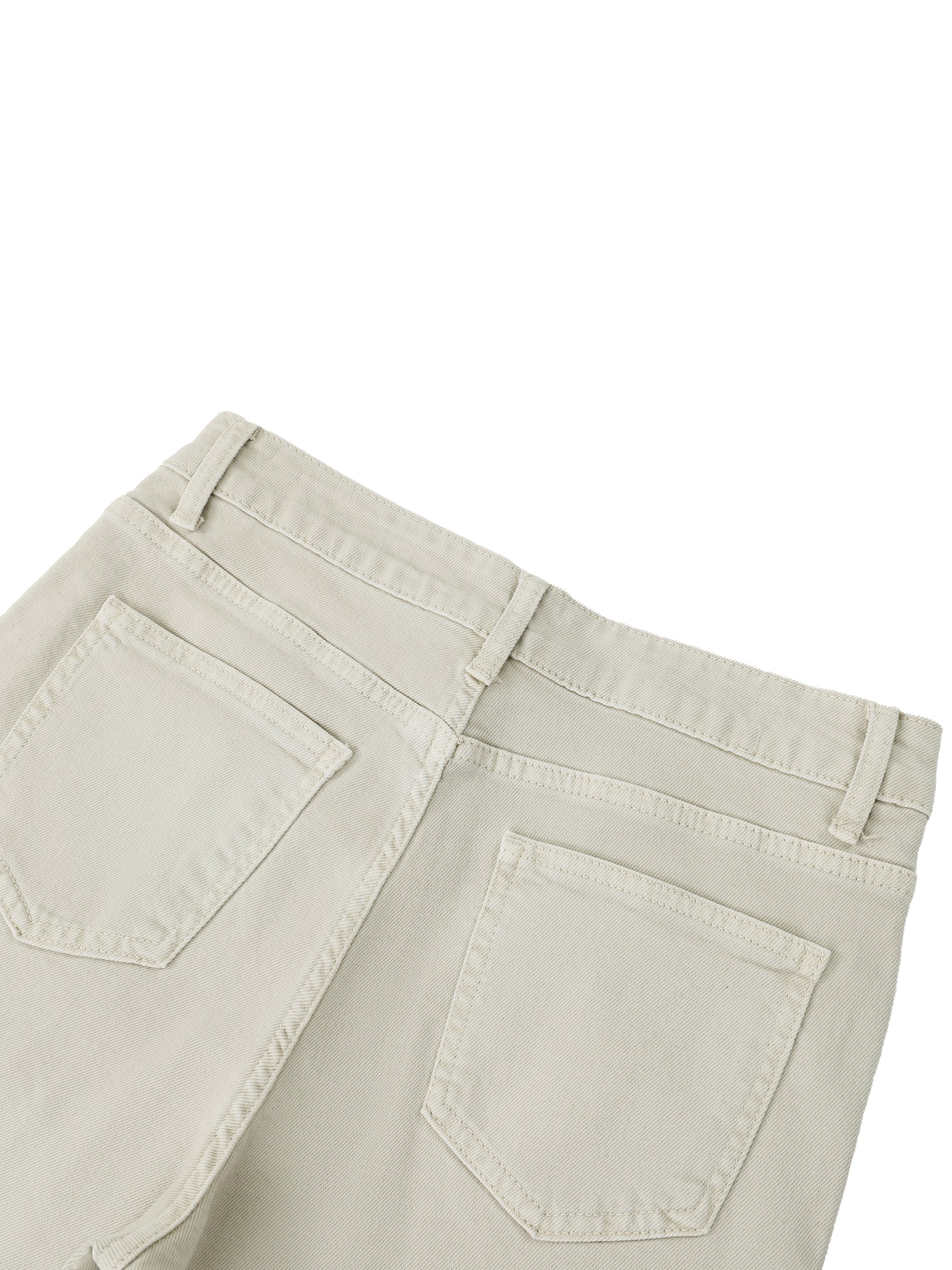 Back view of women's vintage wash flared leg jeans in light beige with two rear pockets