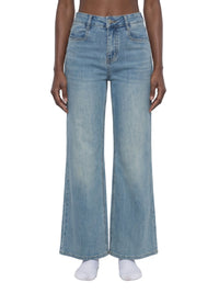 Women's vintage wash high-waisted flared leg jeans on model, front view