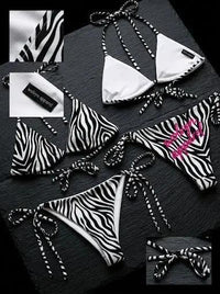 Zebra print string bikini set with contrasting black and white patterns and tie closures.