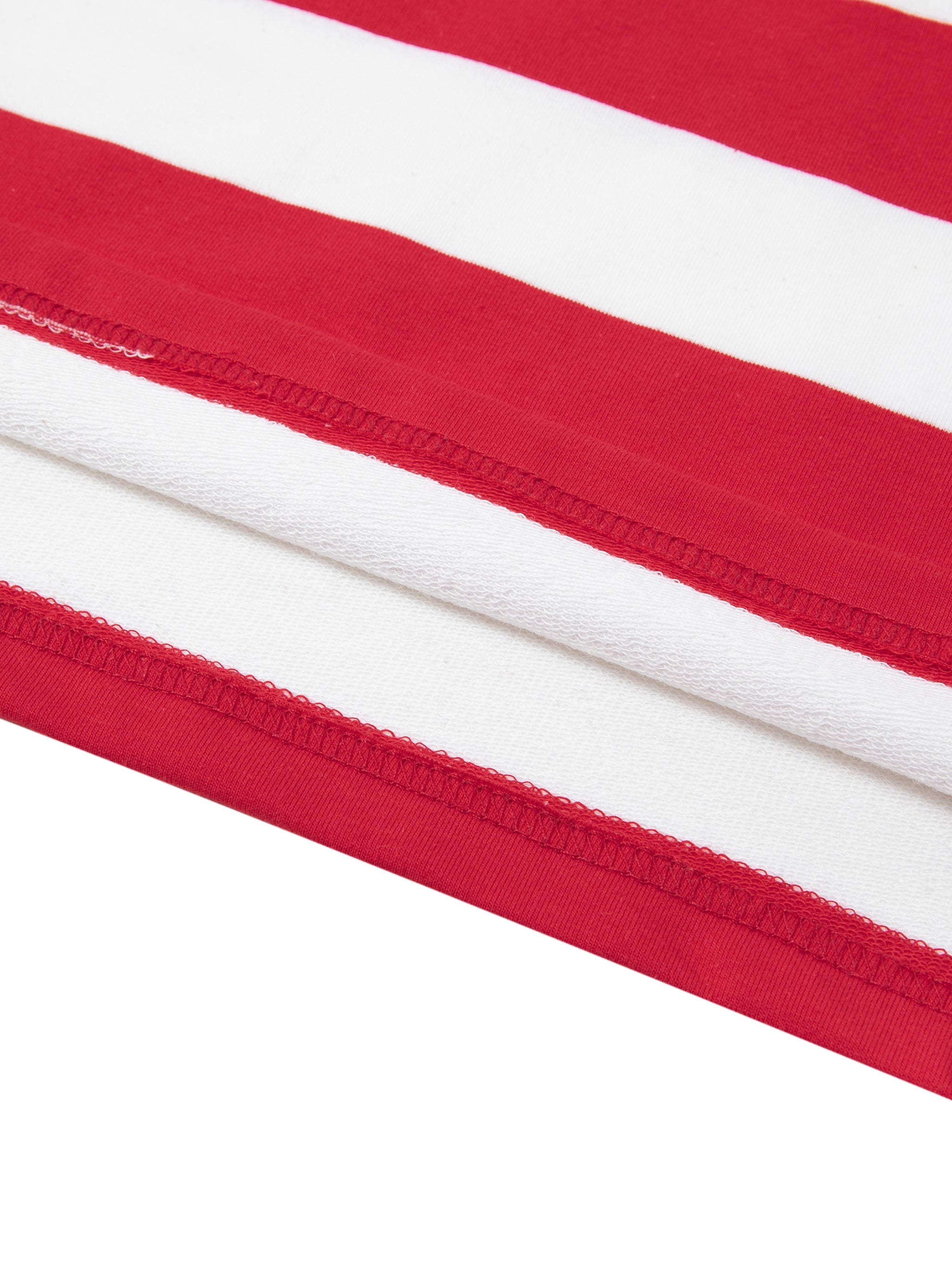 Close-up of red and white color block stripe polo shirt hem with visible stitching