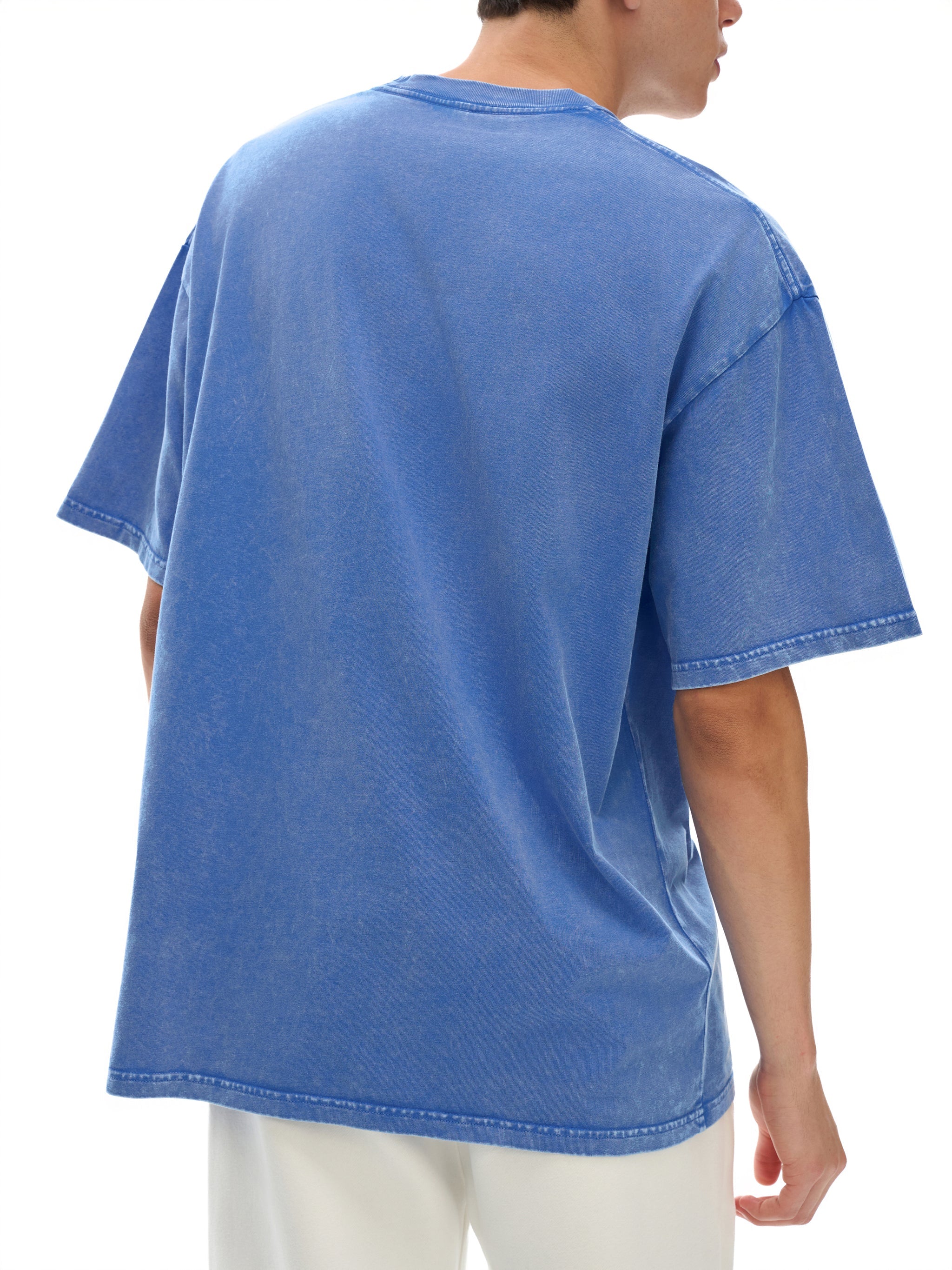Back view of blue snow-washed oversized cotton t-shirt, casual streetwear style