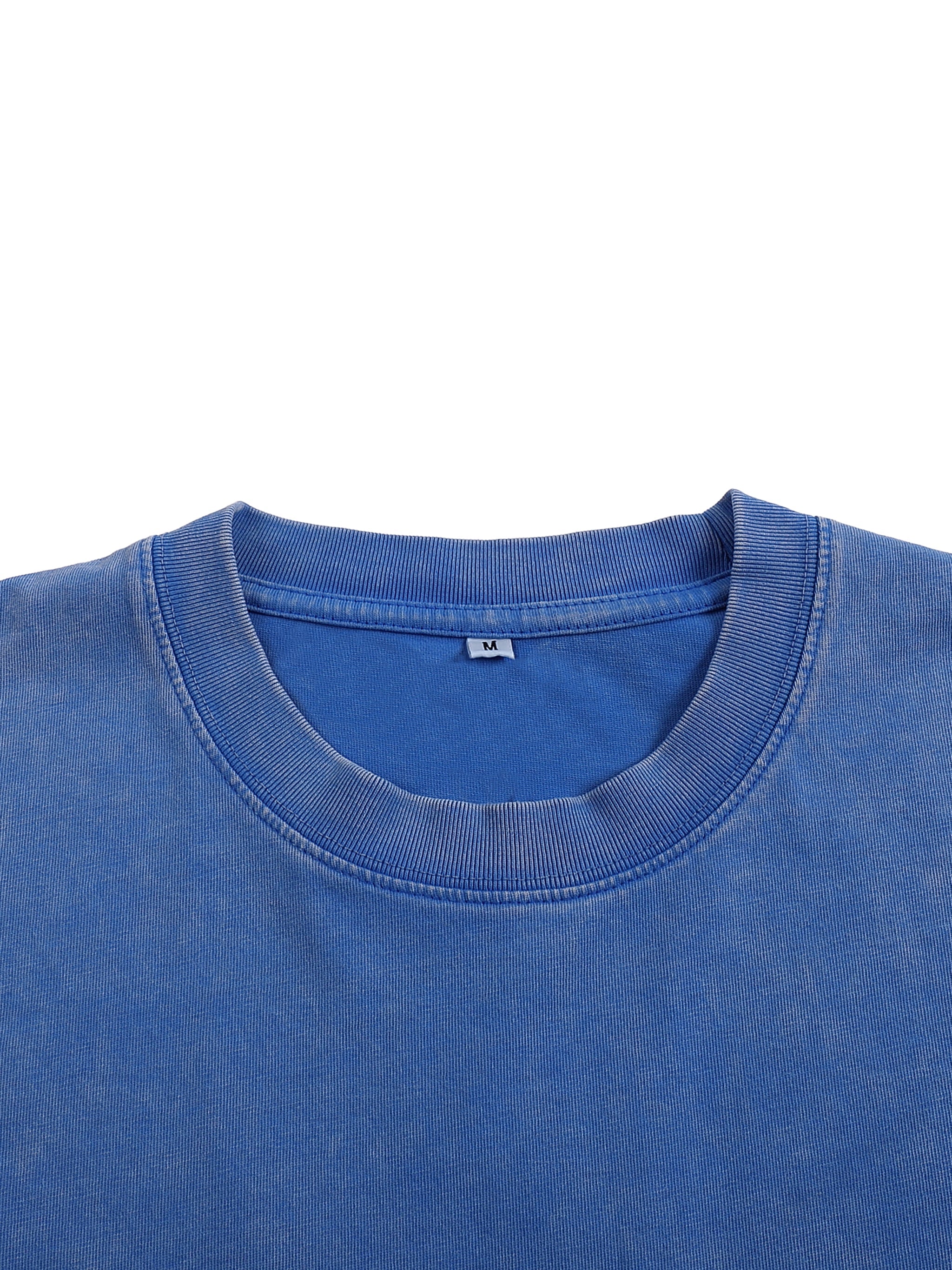 Close-up of snow washed blue oversized cotton T-shirt with ribbed crew neck