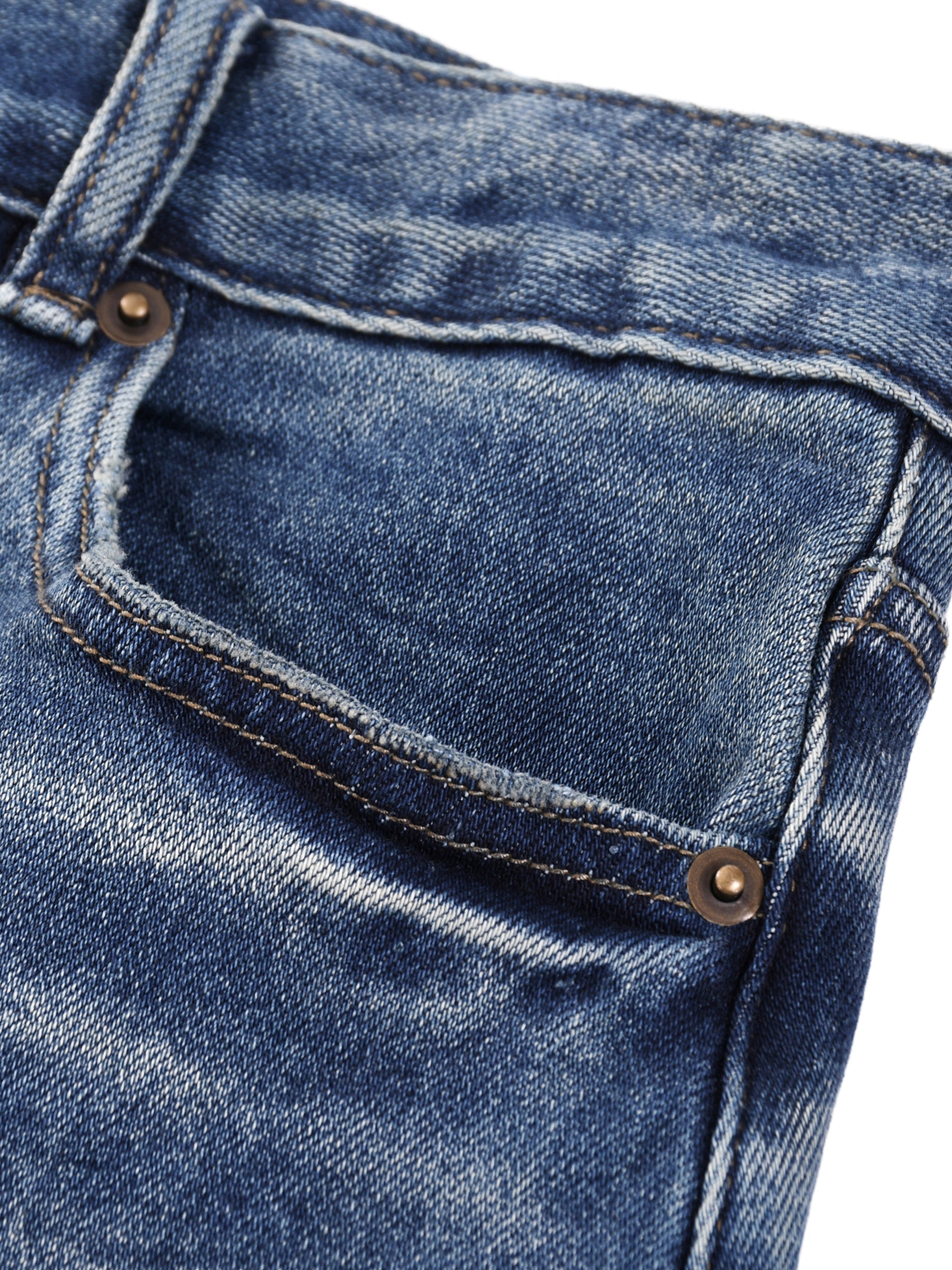 Heavyweight sun-fade denim jeans close-up with front pocket and copper rivets