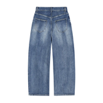 Back view of heavyweight denim jeans with sun-fade wash and wide leg fit on white background