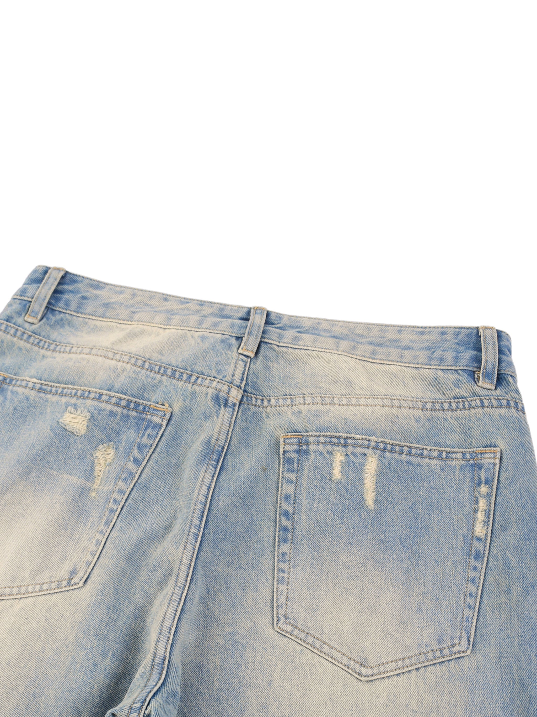 Light wash denim jeans with raw hem, sun-faded effect, and distressed back pockets.
