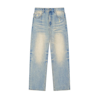 Light wash straight leg denim jeans with sun-faded effect and raw hem, flat lay view