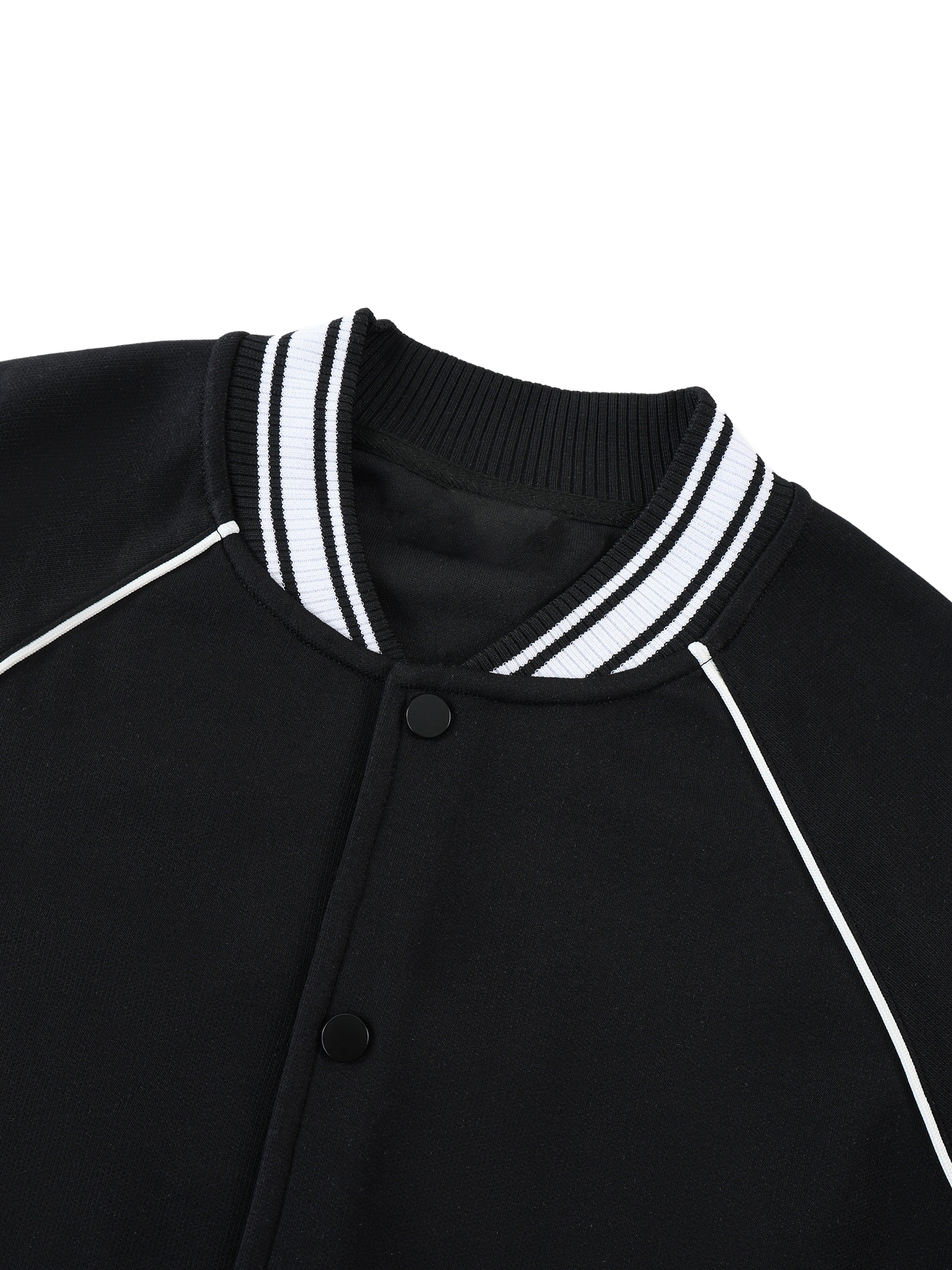 Black varsity raglan jacket with white contrast trim and striped ribbed collar